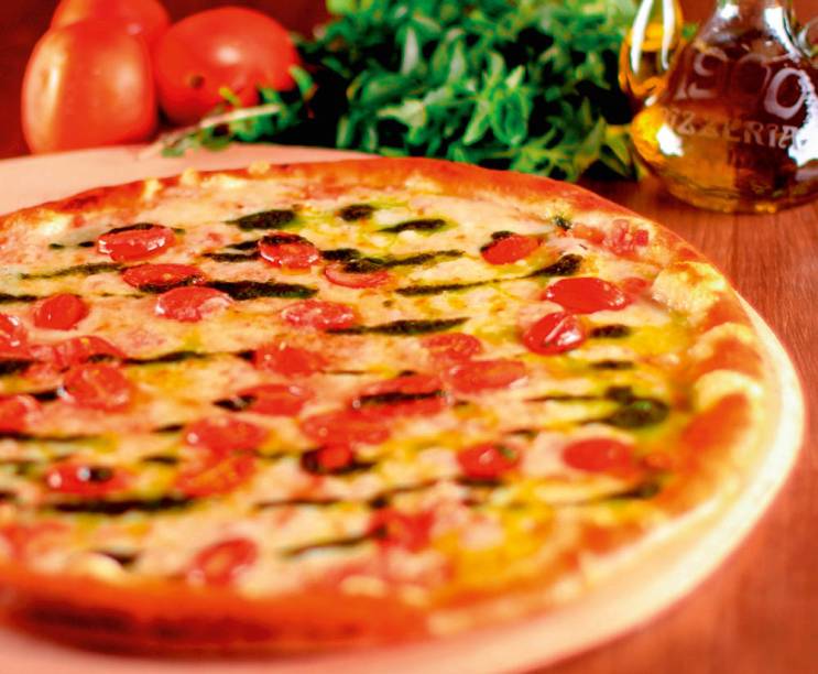 Sem lactose: liguria é a nova cobertura, composta de queijo de ovelha, pesto e tomate-cereja Sem lactose: liguria é a nova cobertura, composta de queijo de ovelha, pesto e tomate-cereja