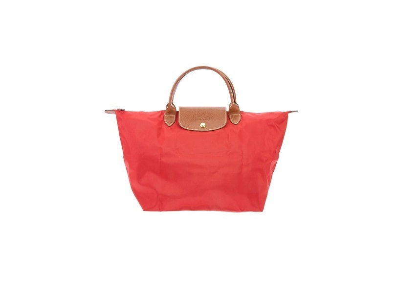 	Bolsa em náilon e couro. R$ 360,00. Longchamp para para Farfetch. www.farfetch.com.br