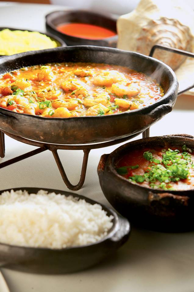 A moqueca capixaba: a receita vem com arroz, pirão e farofa de banana-da-terra A moqueca capixaba: a receita vem com arroz, pirão e farofa de banana-da-terra