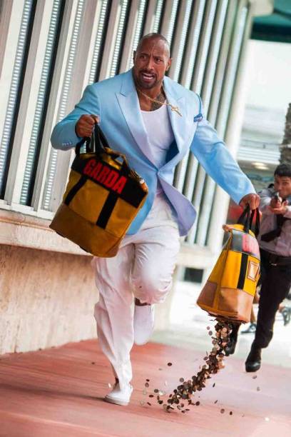 Sem Dor, Sem Ganho: o ex-presidiário Paul Doyle (Dwayne Johnson) Sem Dor, Sem Ganho: o ex-presidiário Paul Doyle (Dwayne Johnson)