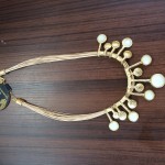 Colar feito com palha de buriti: 60 reais