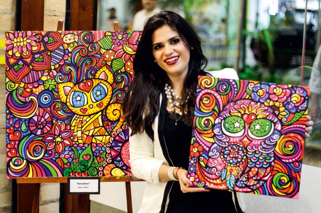 Artista plástica pinta quadro de gatos inspirada em Romero Britto
