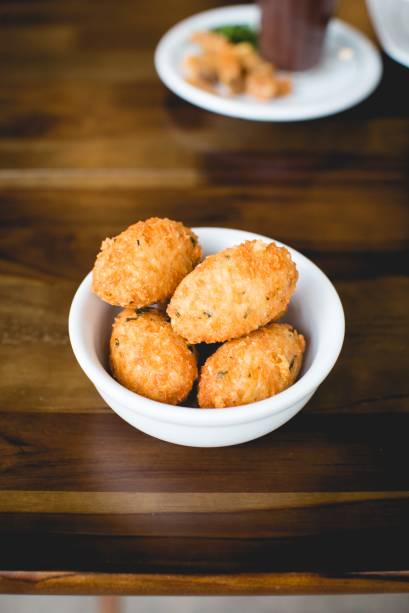 Bolinho de arroz com queijo: pedida popular