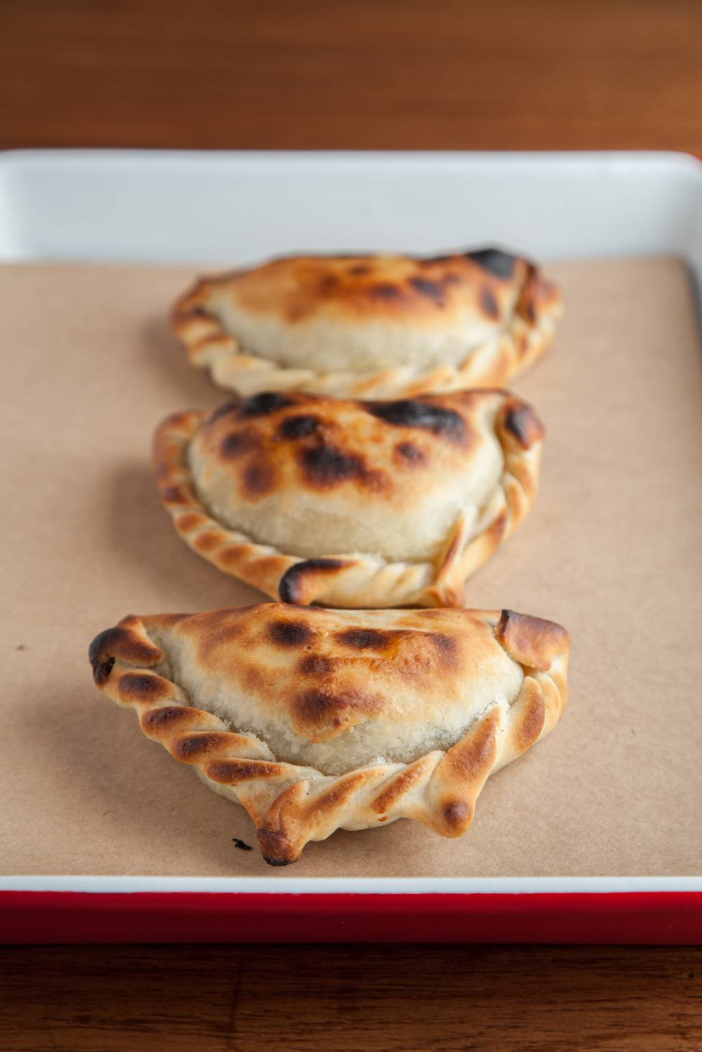 Empanadas (salteña, milho verde, vegana) em composição_04 Empanadas (salteña, milho verde, vegana) em composição_04