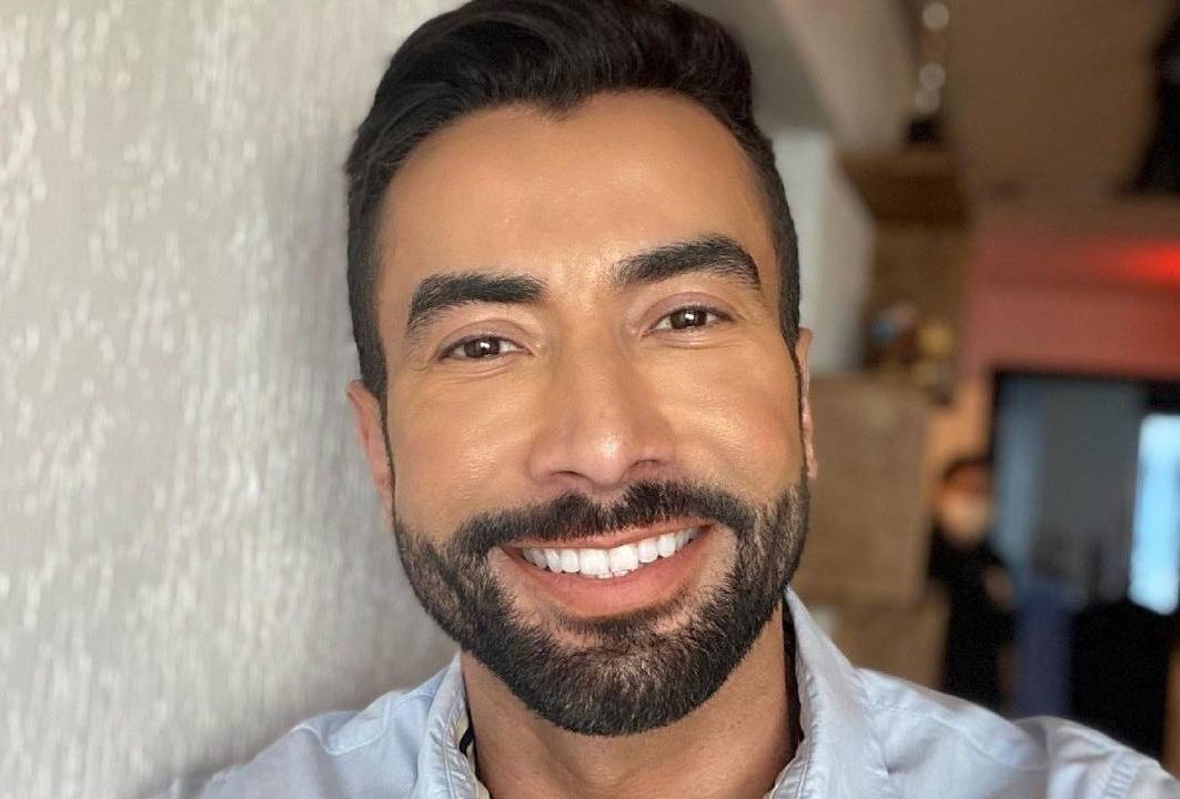 Imagem mostra Luiz Carlos Araújo de barba, sorrindo