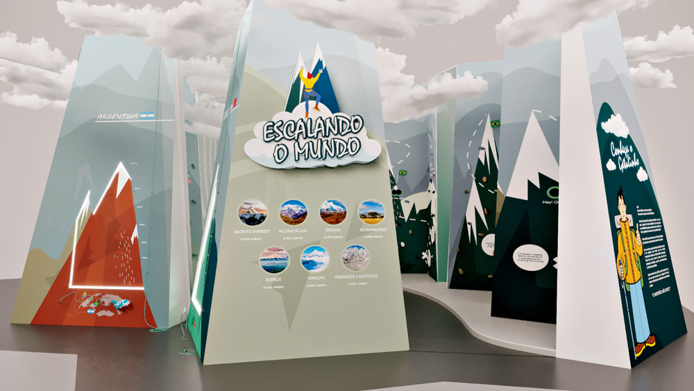 MuseudaImaginacao_SalaEscalada-Revista_View03.jpg Em um espaço expositivo, há placas grandes, do chão ao teto, em formato triangular 3D, sobre montanhas, com imagens, gráficos e ilustrações