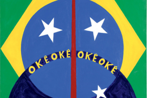 Imagem mostra releitura da bandeira do brasil com o escrito "Okê Okê Okê Okê", ao centro.