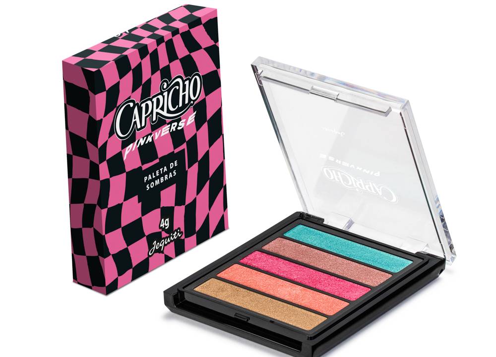 uma paleta de sombras para olhos ao lado de uma caixa